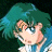 Pixelated anime-style character with teal hair and blue eyes, wearing a blue and white outfit, positioned next to black background with white text.