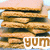 Stack of pancakes with dark strips, light background, and 'YUM' text in brown letters at bottom right.