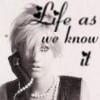 Black-and-white image of a person with short hair wearing a dark jacket and pearl necklace, with text overlay reading 'Life as we know it' in stylized script.