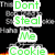 A pixelated digital image with layered text and flame effects, featuring green 'Dont Steal Me Cookie' text over a black background.