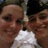Two people in a close-up photo on the left, with a blue background and yellow text reading "Alex & Dominique" on the right.