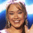 A 48x48 pixel buddy icon split into two frames showing a smiling woman with light brown hair on the left and green text reading "Original Icons .com" on a dark green background on the right.