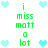 Pixelated green text 'i miss matt a lot' surrounded by light blue heart icons in a pattern on white background