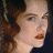 A 48x48 pixel buddy icon featuring a split composition with a woman's face on the left and 'MOULIN ROUGE!' text on the right, rendered in low-resolution pixel art style.