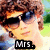 A person with curly brown hair and sunglasses appears in four , each showing different text overlays