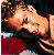Pixelated image of a person with closed eyes resting on a red surface, accompanied by bold red text reading "Yum" and "Paul Walker".