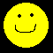 Six yellow circular faces with black pixelated features on a black background, one face partially obscured by gray rectangle.