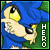 Blue anthropomorphic hedgehog with yellow eyes and black nose, hand near mouth in a thoughtful pose against green background with vertical 'HERO' text.