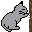 Pixelated gray cat with black outline sits beside brown vertical post, first facing left then turning right.