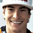 A pixelated image shows a person wearing a white cap and dark clothing, with orange text reading "I Love Nicky Hayden" on the right side.