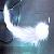 Pixelated static image of a white crescent shape against dark and light blue background with scattered bright pixels.