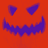 A red pumpkin face with blue triangular eyes and jagged mouth, displayed in a