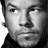 A black-and-white photo of a man's face appears in the top-left corner, with text elements including 'MARK WAHLBERG' and 'BOBBY MERCER' in bold red and gray lettering across the image.