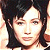 A 50x50 pixel animated buddy icon featuring a split composition with a person's face on the left and green text on a dark background on the right, displayed as two sampled frames in a contact sheet layout.