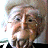 A 48x48 pixel animated buddy icon featuring a cartoon elderly woman on the left and green text "OriginalIcons.com" on a dark green background to the right, displayed as a contact sheet with two frames.