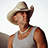 A pixelated image shows a person wearing a light-colored cowboy hat and sleeveless shirt against a bright background, with repeated text on the right side.