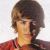 A 50x50 pixel animated contact sheet showing two frames of a cartoon-style character with brown hair and red shirt, one frame featuring the word "SIZZLE" in dark text above the head.
