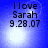 Blue background with white light effects and black text reading 'I love Sarah 9.28.07' in four identical