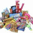 Pixelated image of a character with raised arms surrounded by colorful objects on white background, red text overlays read 'CANDY!!!...' and 'makes me hyperrr!!!' in pink.