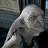 Pixelated image of a person with light hair and dark clothing, next to blue text reading "In the Name Of Brave Regulus Fight!" and "Fight for My Master Dark Lord, Defender In the name Of House-elve: Regulus".