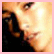 A pixelated close-up of a person's face with light skin tone, dark hair, and a neutral expression, followed by a view of the person's torso wearing a dark top with a light-colored strap.