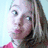 A pixelated image shows a person with light brown hair and blue eyes on the left, next to vertical rainbow stripes and blue text reading "Jessah Bella" on the right.