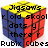 Pixelated cube with yellow top, blue left face, red right face; black text overlays read 'Jigsaws', 'old skool', 'dots y there r', 'Rubix Cubes' on white background.