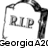 A static image of a tombstone with 'RIP' text, overlaid with 'Georgia A20' text in black and orange, and a gray rectangle covering part of the image.