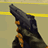 Pixelated image of a dark handgun with orange accents against beige background, next to green text reading 'Original Icons .com' in bright green pixel font.