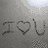 Four distinct pixelated images arranged in a , each depicting love-themed content with text and symbols