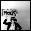 Black-and-white image of a person wearing a cap and jacket, raising one hand, with a sign reading 'Rock' above them.