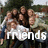 Group of people outdoors with text 'friends are love.' in white pixelated font over the image.