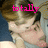 A pixelated image of a person with light brown hair in a close embrace, overlaid with pink text reading 'totally' and 'in' across different frames.