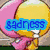Pixelated icon with a yellow-haired character in pink clothing holding a blue 'sadness' text box, set against a green and brown background.