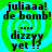 Pixelated text on a green and cyan spiral background with repeated phrases 'juliaaa! de bomb!' and 'dizzy yet ??' in black font.