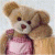A pixelated teddy bear icon with a green text logo on the right side, displayed as part of an animated contact sheet.