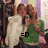 Two pixelated figures embrace; one wears a white dress, the other green clothing with brown hair and black eyes. A '=D' text symbol appears below them.