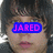 A pixelated face with dark hair and a blue rectangular overlay containing pink text that changes from 'JARED' to '<39'.