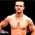 Static pixelated image of a shirtless male figure with muscular build against dark background, wearing black wristbands and displaying visible chest hair.