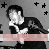 Black-and-white image of a person singing into a microphone with stars in the background, text changes from red pixelated bars to 'THURSDAY' across frames.