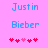 Pixelated blue text 'Justin Bieber' on pink background with red and pink heart symbols below, two identical frames showing animation change in heart positions.