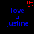 Blue pixelated text 'i love u justine' on black background with red heart symbol above 'i'