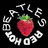 Pixelated strawberry with green top surrounded by white stylized text on black background.