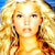 Static pixelated image of a person with long blonde hair and braids, wearing an orange top against a bright background.