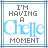 Pixelated text reads "I'M HAVING A Chelle MOMENT" with blue and gray colors, framed by a border