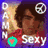 A pixelated image with a purple background, featuring partial text and symbols including "DREAM" vertically on the left, a peace sign in the top right, and "Sexy" at the bottom center.