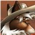 Pixelated close-up of a character's face with brown fur, white muzzle, and dark eyes, set against a warm-toned background.