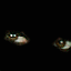 Animated sequence of stylized eyes with varying expressions against a black background, showing subtle shifts in gaze and eyelid position.