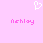 A static pixel art image with a light pink background, featuring a white heart outline at the top and two instances of the name 'Ashley' in pink text below.