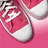 Pixelated image of pink and white sneakers with visible laces on a solid pink background, featuring the text 'Morissa' in pixelated font.